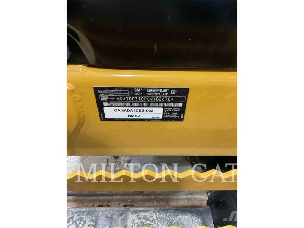 CAT 310 Rupsgraafmachines