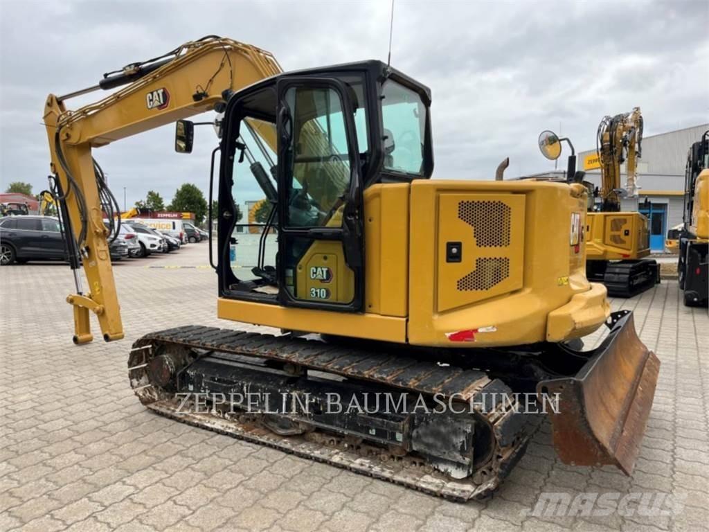 CAT 310 Rupsgraafmachines