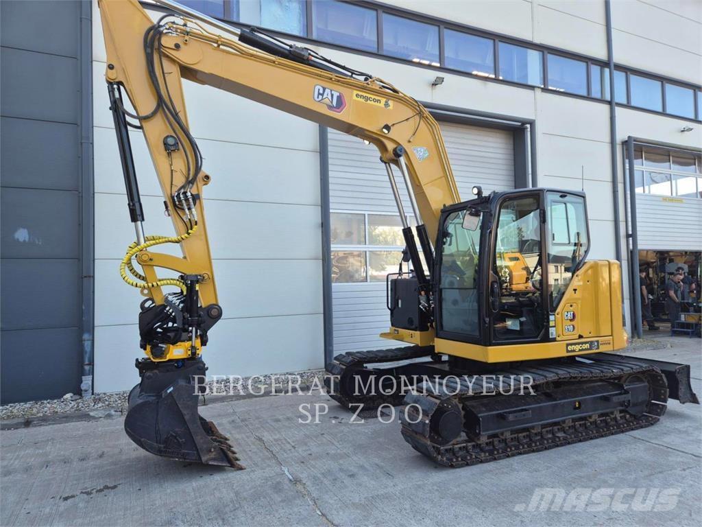 CAT 310 Rupsgraafmachines