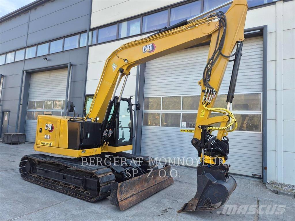 CAT 310 Rupsgraafmachines
