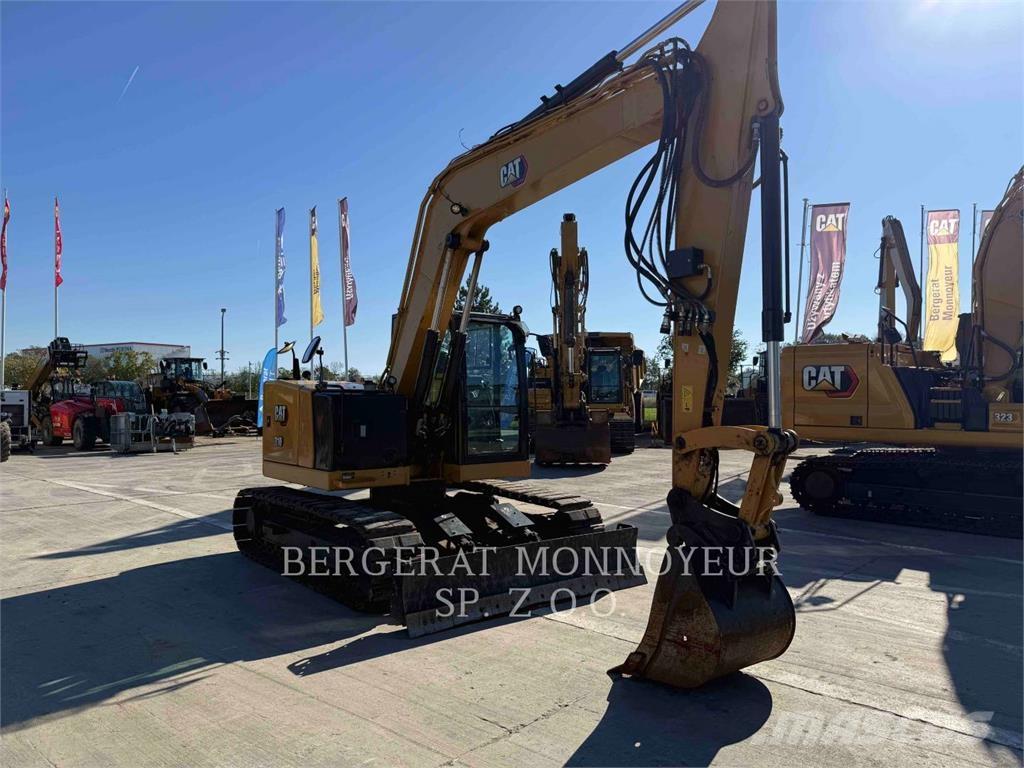 CAT 310 Rupsgraafmachines