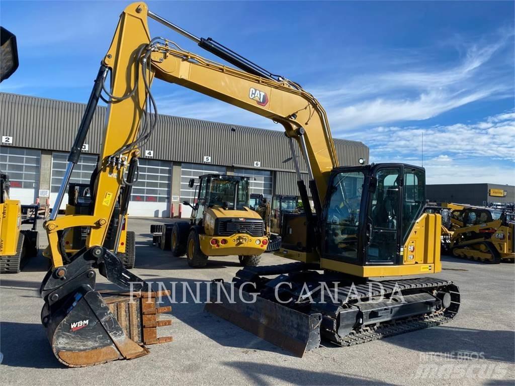 CAT 310-07 Rupsgraafmachines