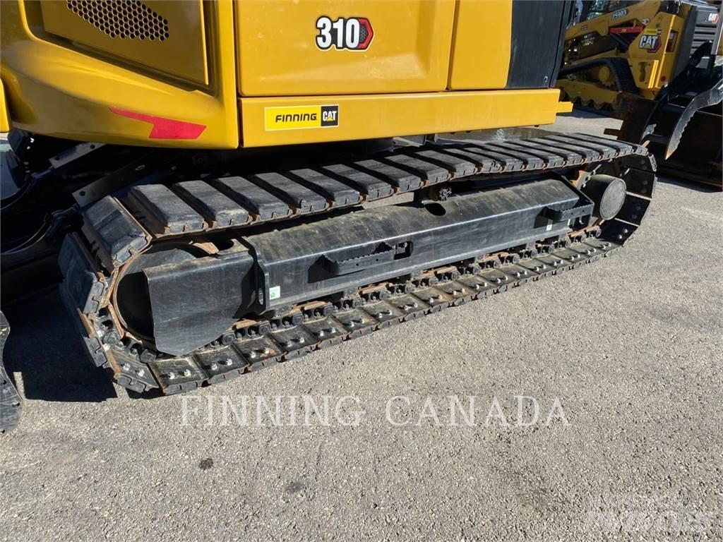 CAT 310-07 Rupsgraafmachines