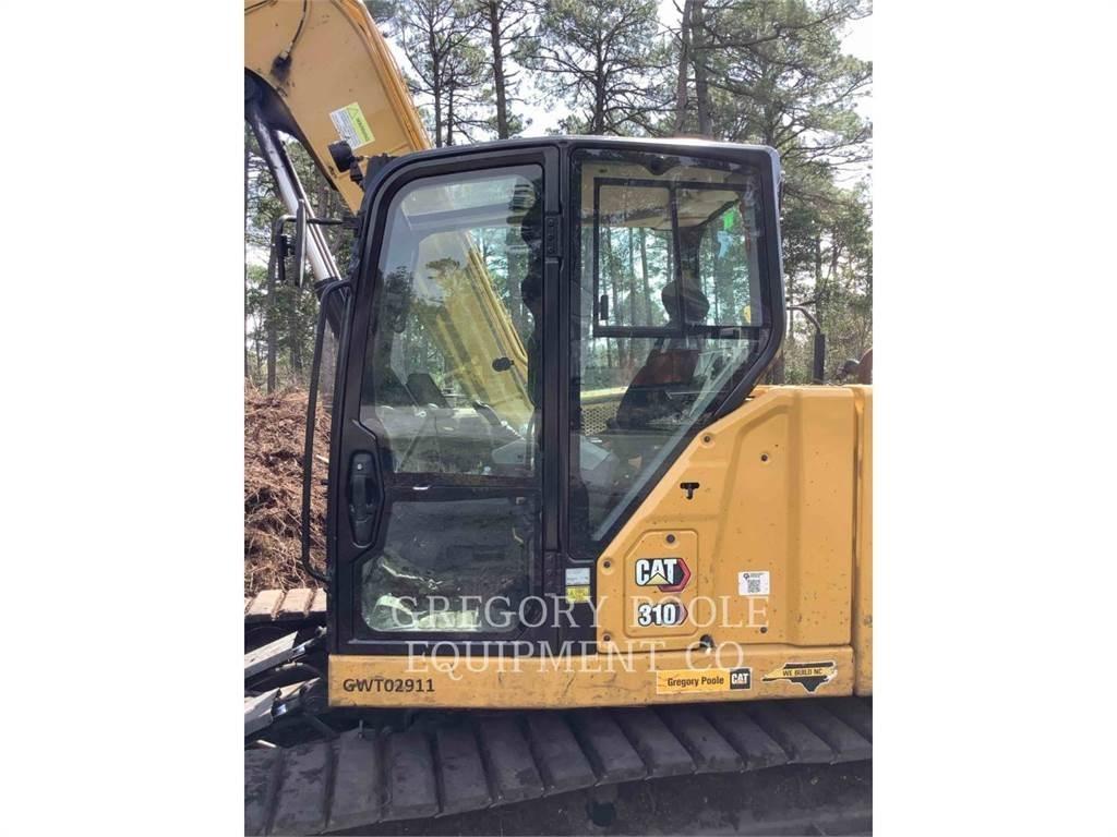 CAT 310-07 Rupsgraafmachines