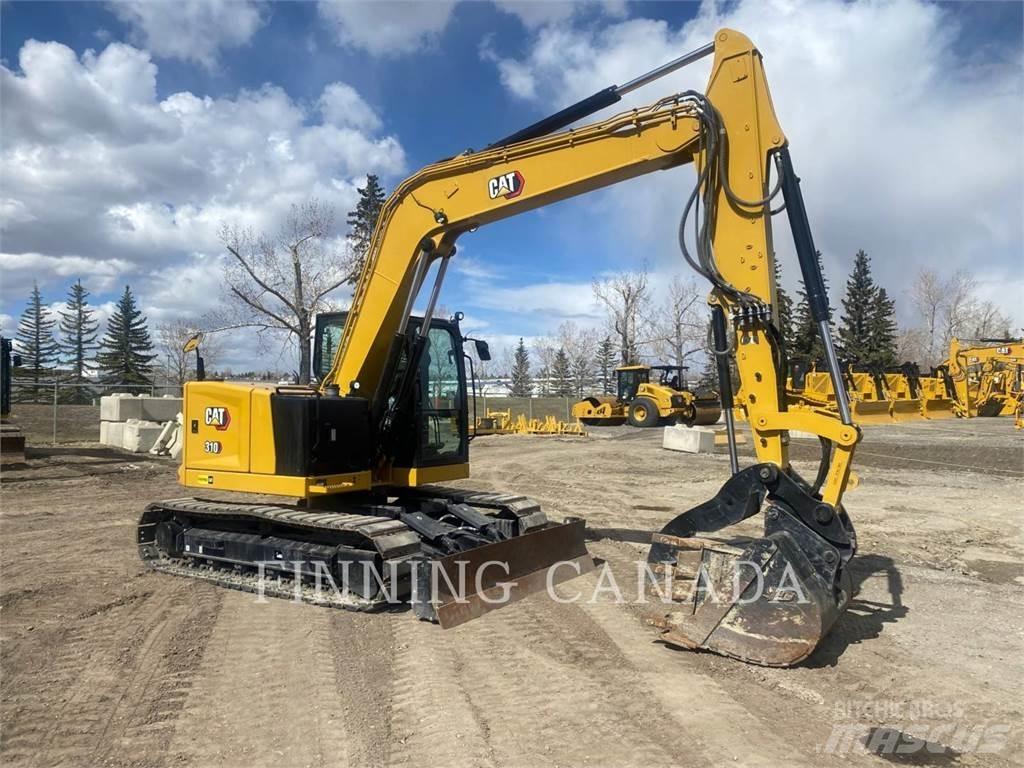 CAT 310-07 Rupsgraafmachines
