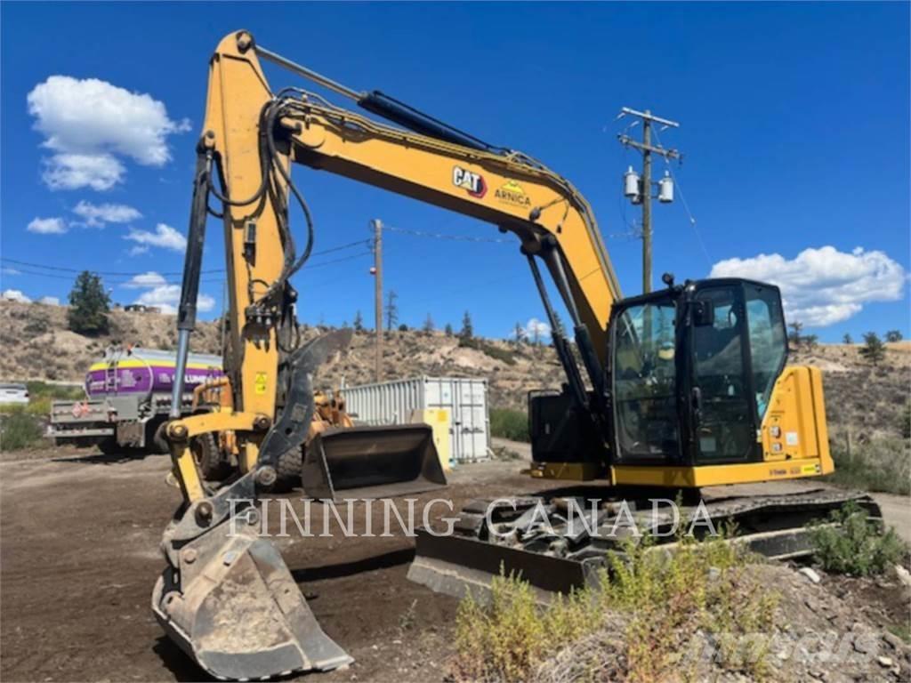 CAT 310-07 Rupsgraafmachines