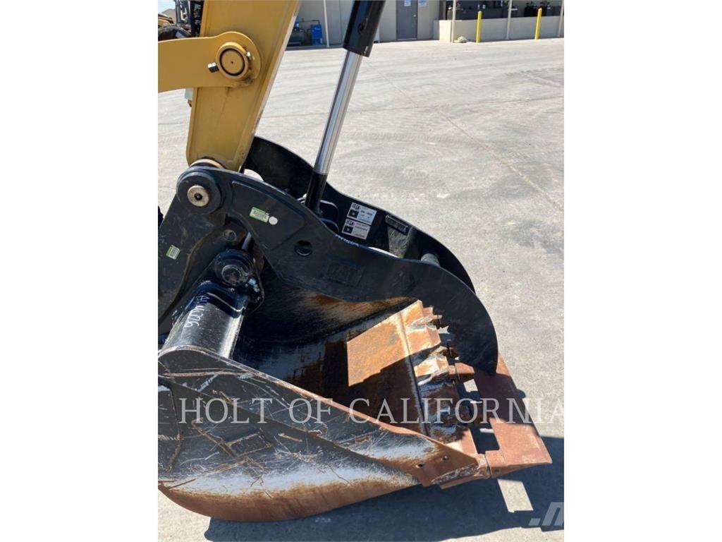 CAT 310-07 Rupsgraafmachines