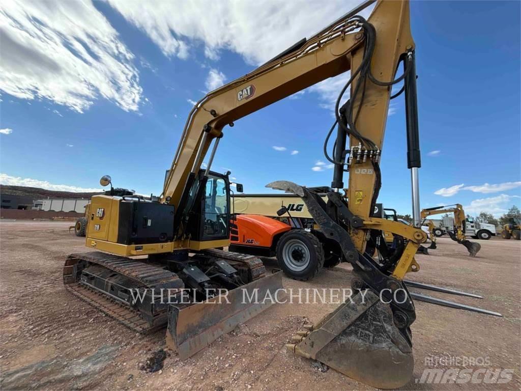 CAT 310 TH Rupsgraafmachines