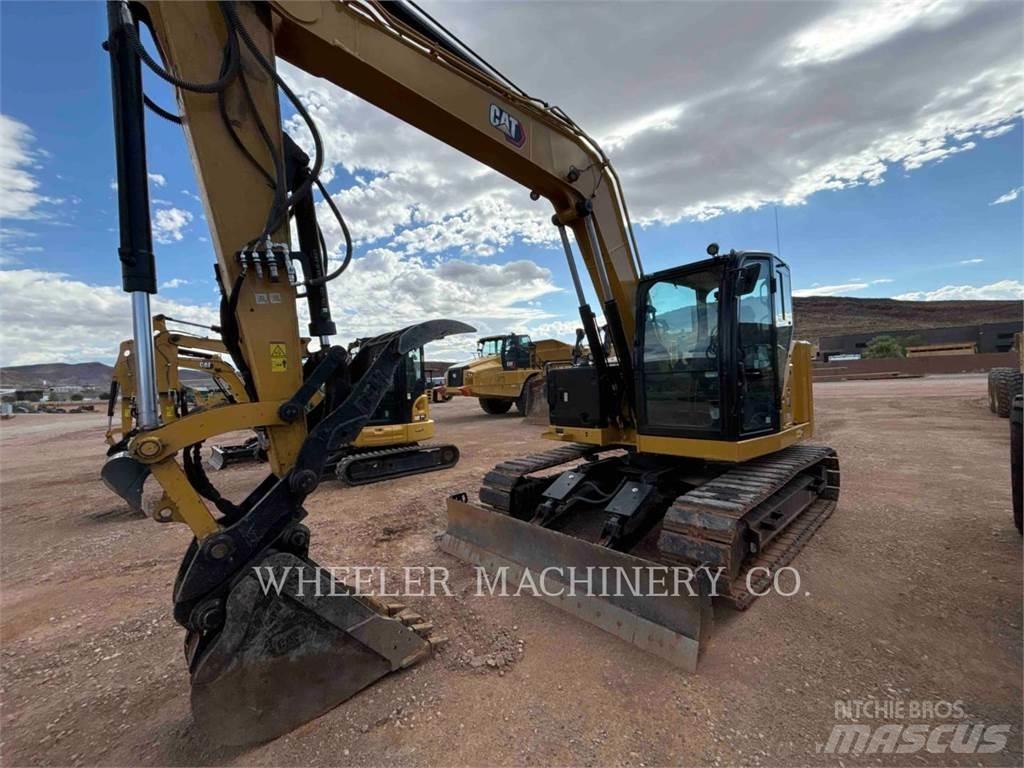 CAT 310 TH Rupsgraafmachines