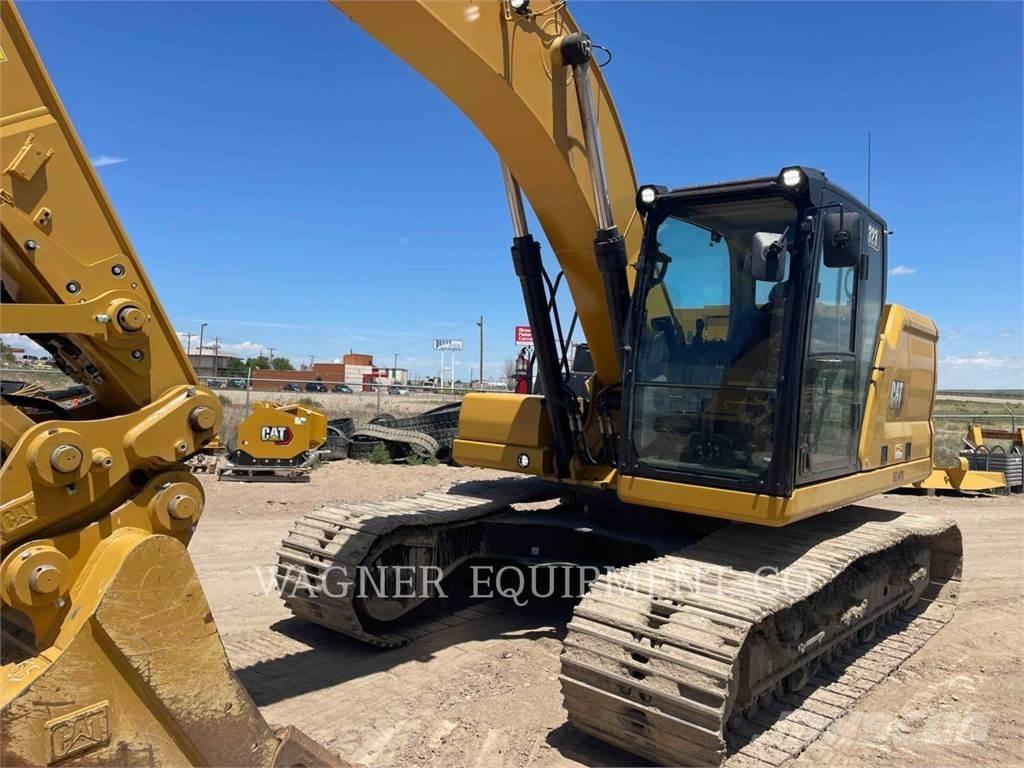 CAT 323 Rupsgraafmachines