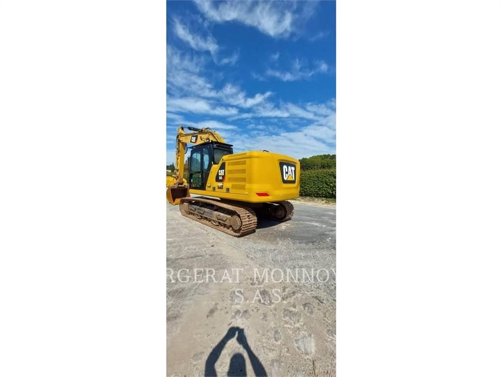 CAT 323 Rupsgraafmachines