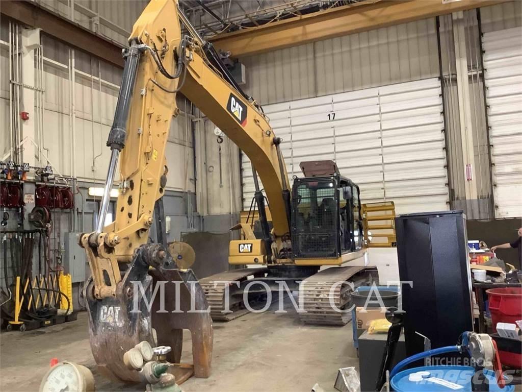CAT 323 Rupsgraafmachines