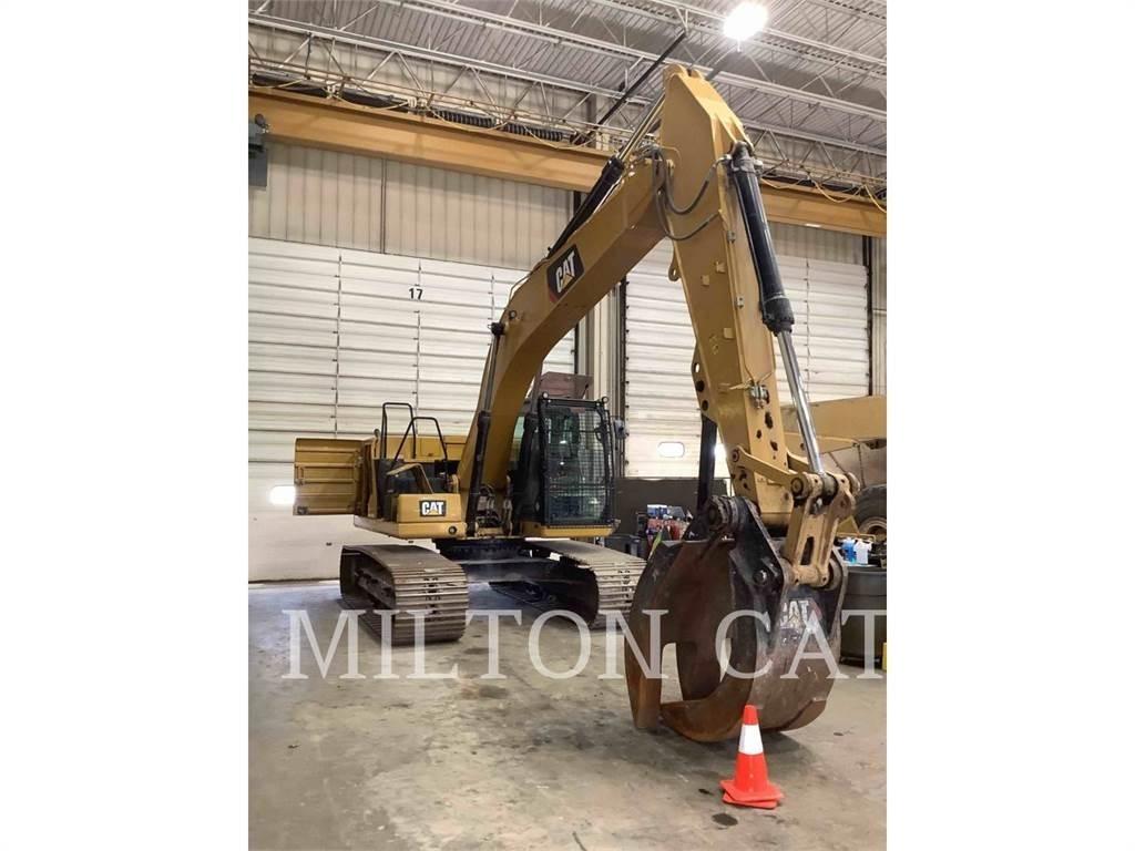 CAT 323 Rupsgraafmachines