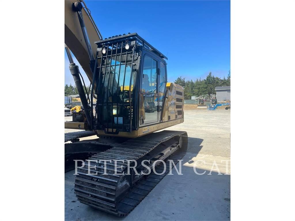 CAT 323 Rupsgraafmachines