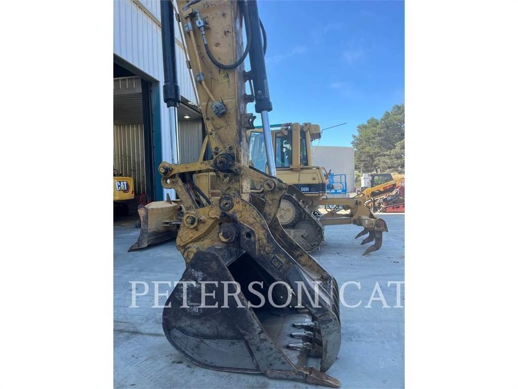 CAT 323 Rupsgraafmachines
