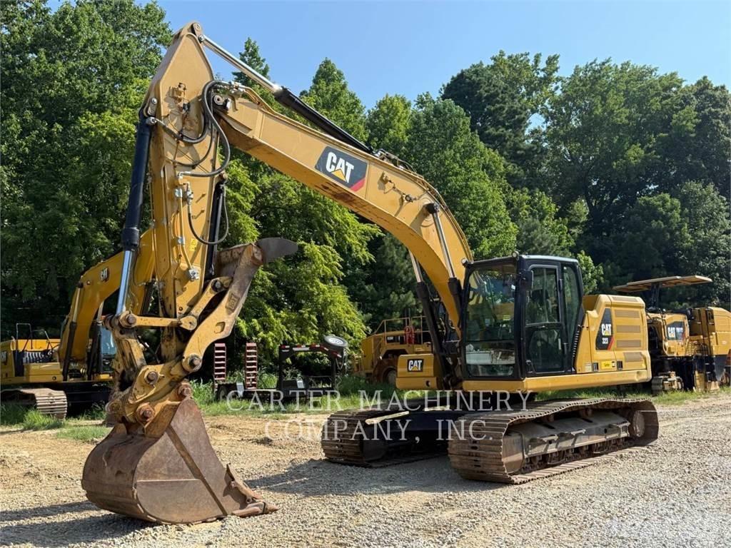 CAT 323 Rupsgraafmachines