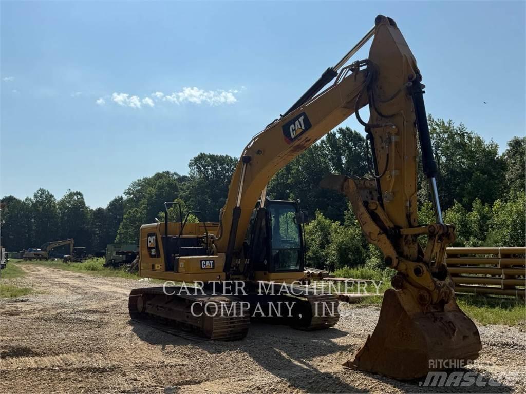 CAT 323 Rupsgraafmachines