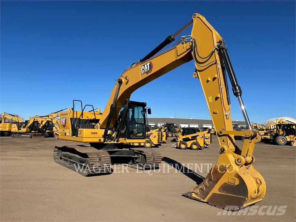 CAT 323 Rupsgraafmachines