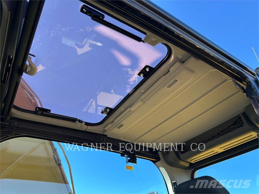 CAT 323 Rupsgraafmachines