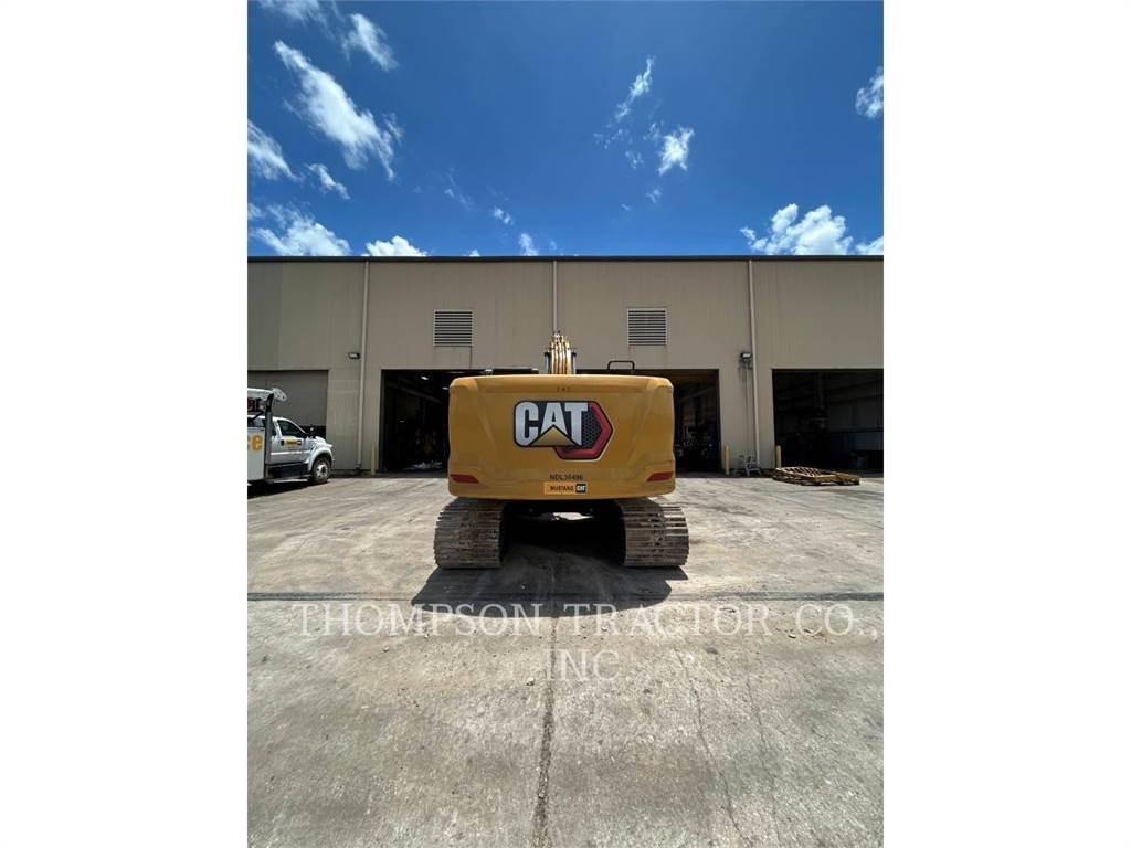 CAT 323 Rupsgraafmachines