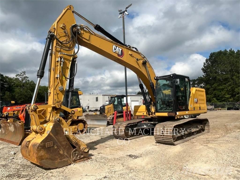 CAT 323 Rupsgraafmachines