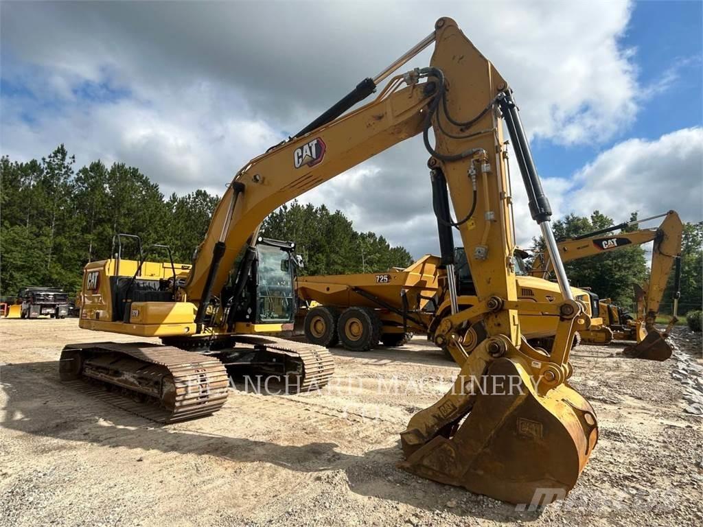 CAT 323 Rupsgraafmachines