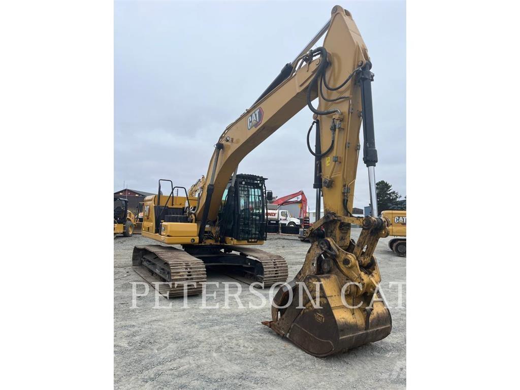 CAT 323 Rupsgraafmachines