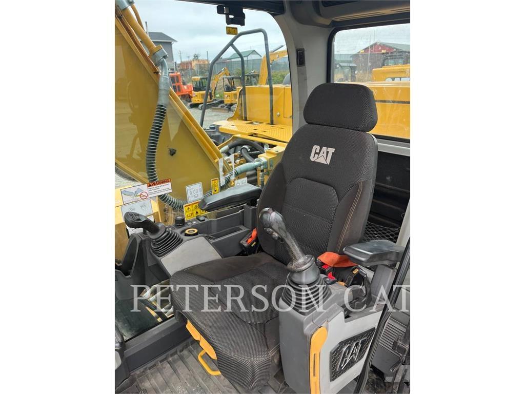 CAT 323 Rupsgraafmachines