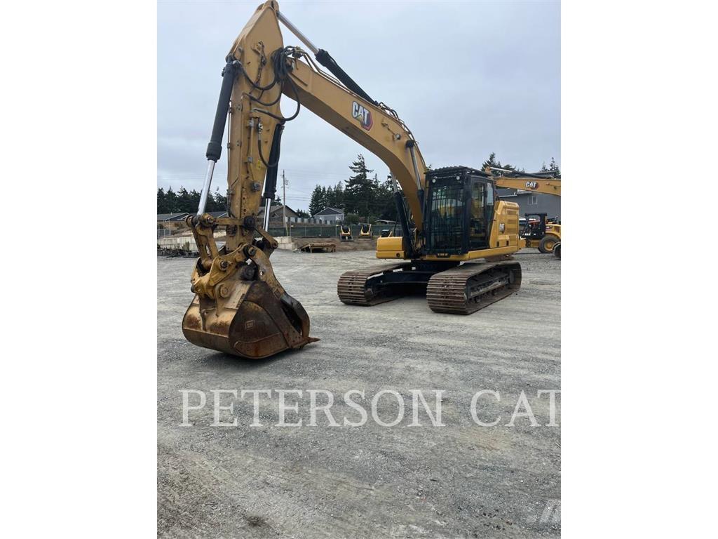 CAT 323 Rupsgraafmachines