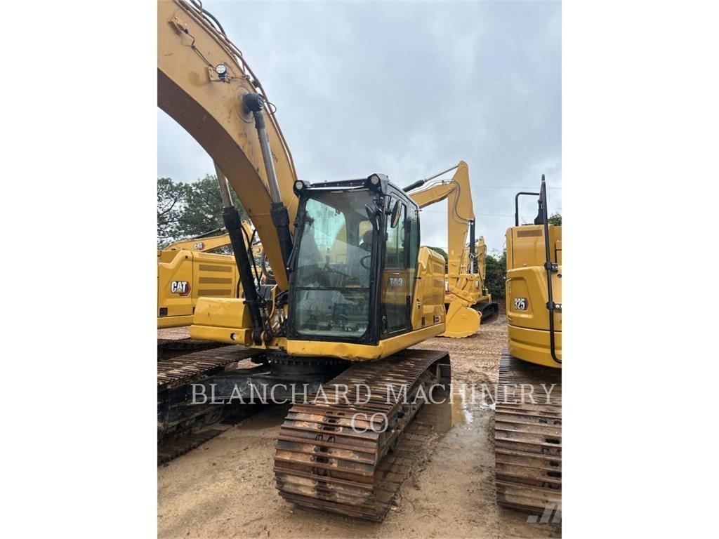 CAT 323 Rupsgraafmachines