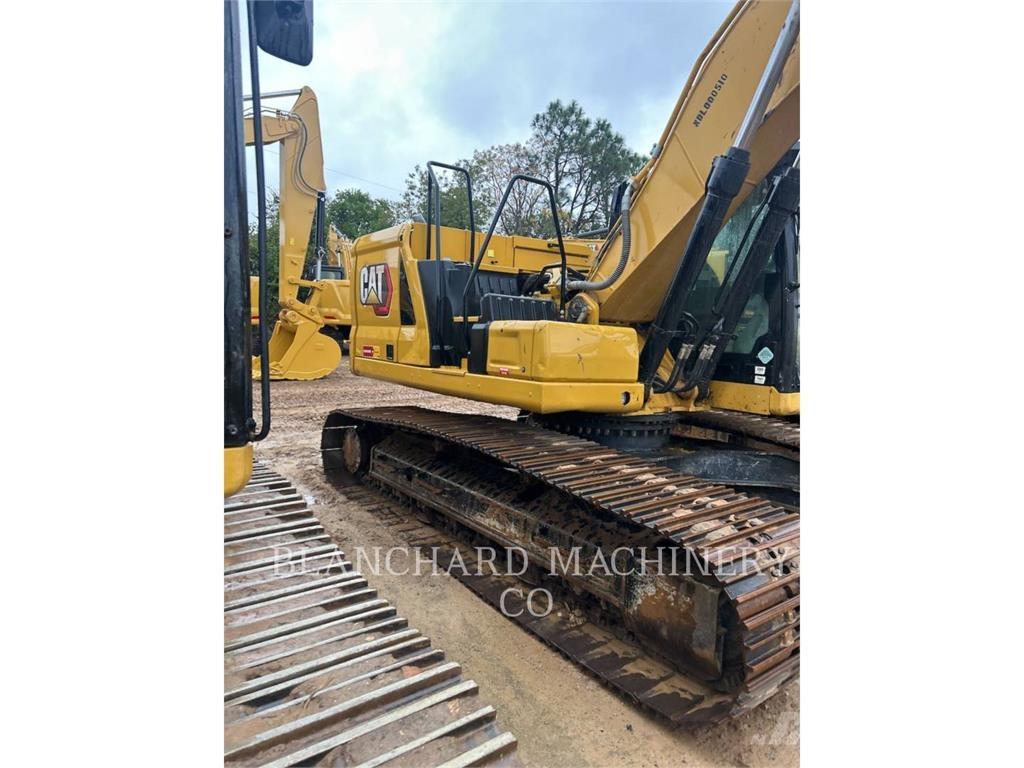 CAT 323 Rupsgraafmachines