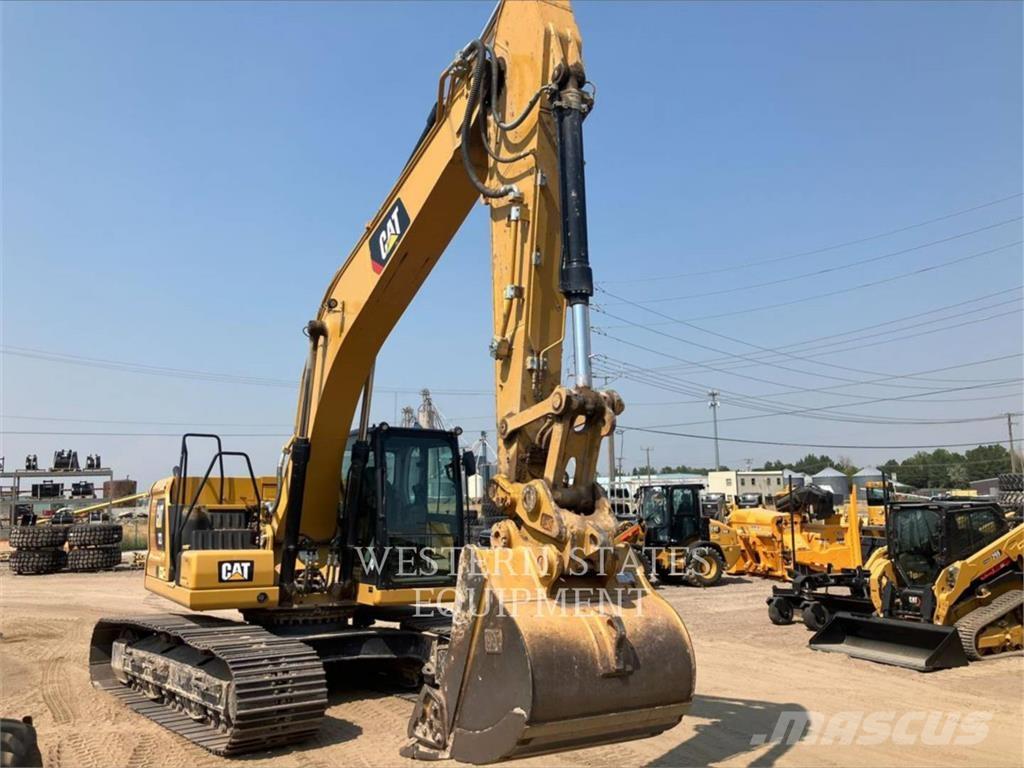 CAT 323 Rupsgraafmachines