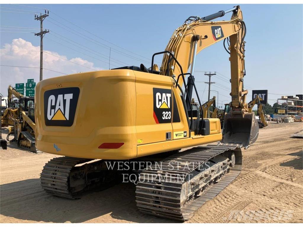 CAT 323 Rupsgraafmachines