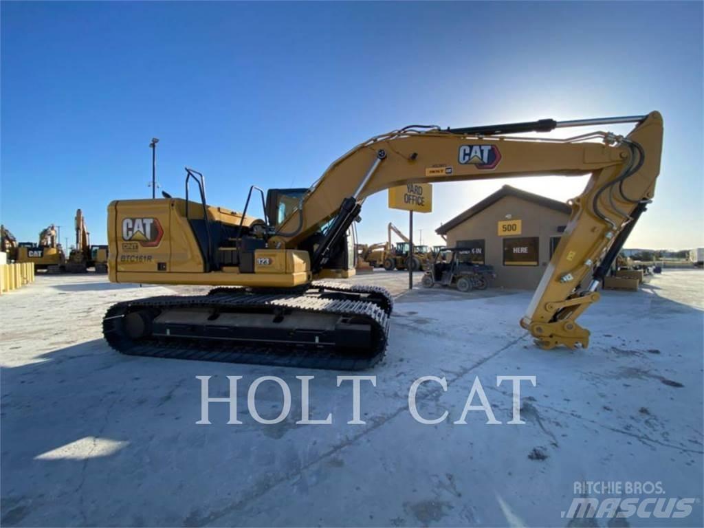 CAT 323 TC Rupsgraafmachines