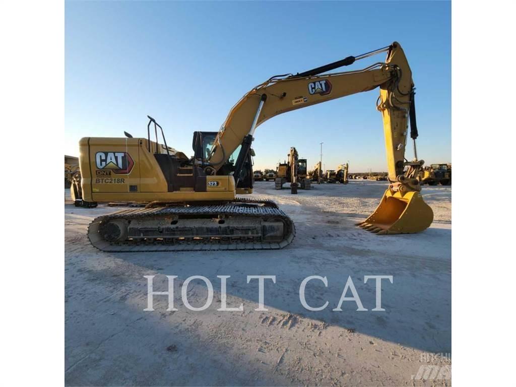 CAT 323 TC Rupsgraafmachines
