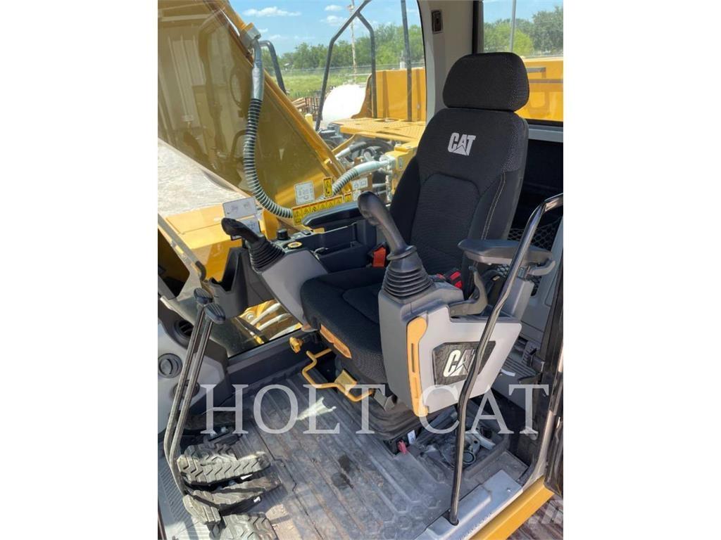 CAT 323 TC Rupsgraafmachines
