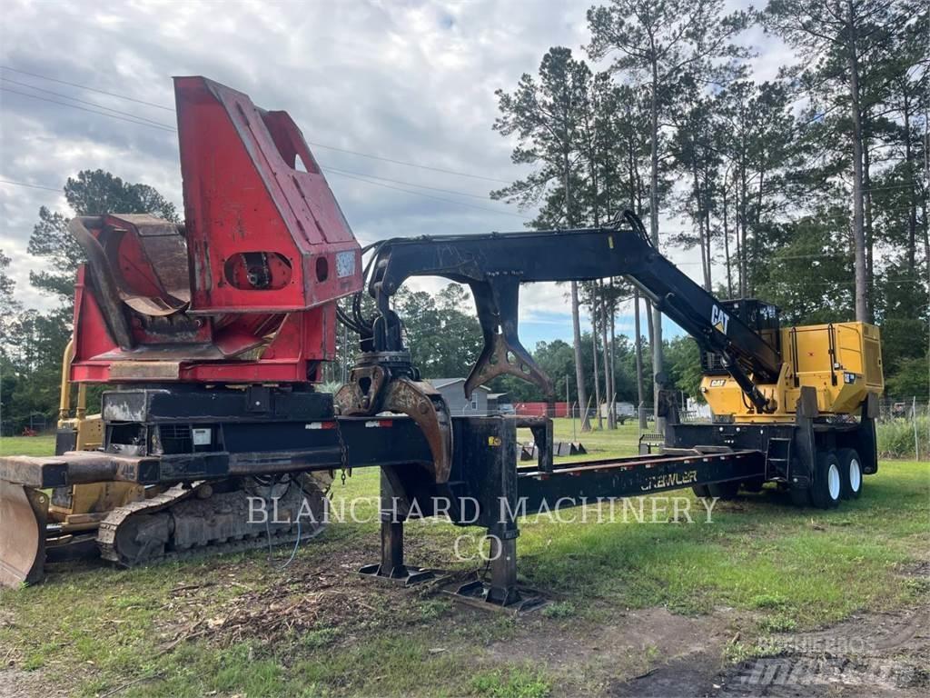 CAT 559D Boomstamladers