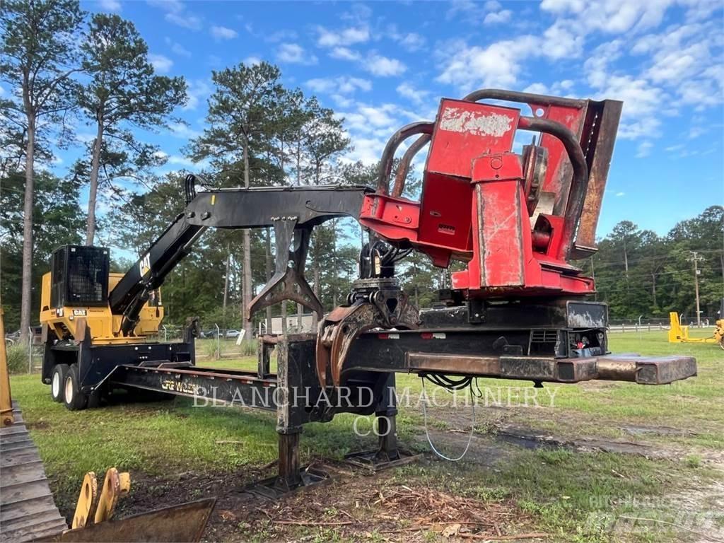 CAT 559D Boomstamladers