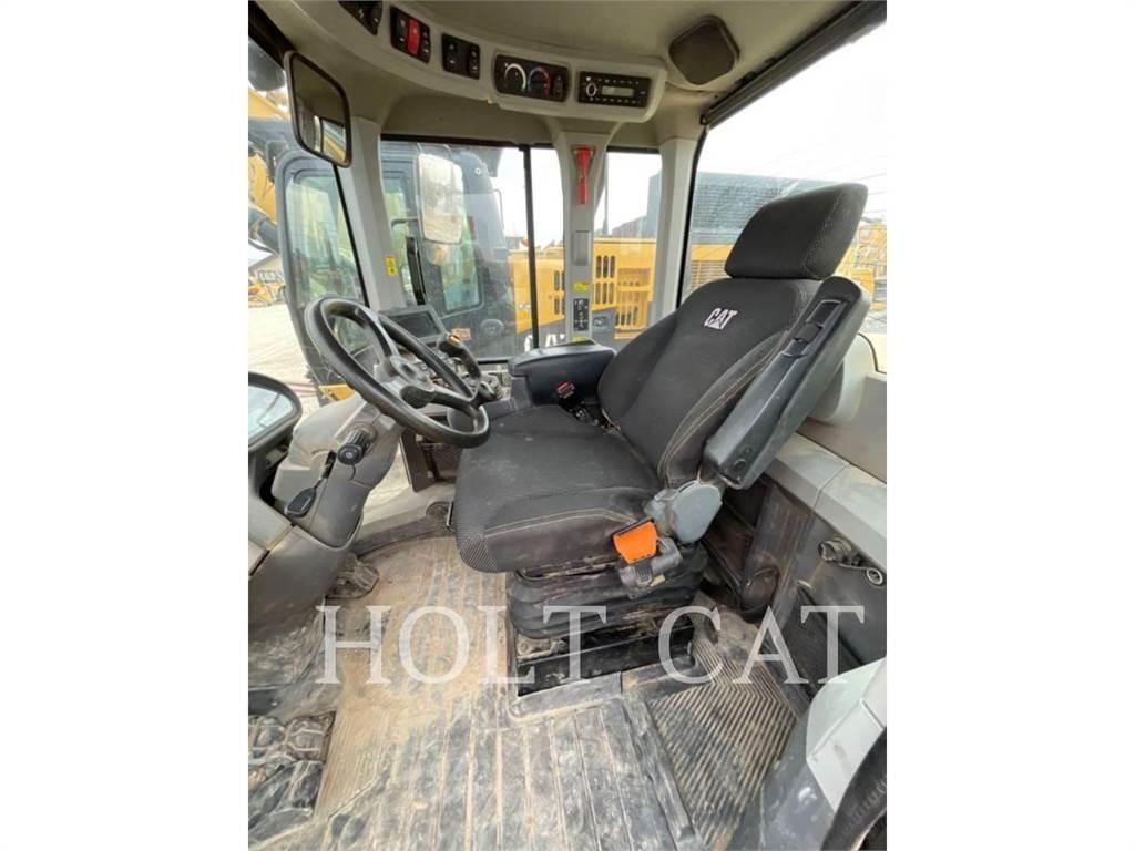 CAT 938M QC Wielladers