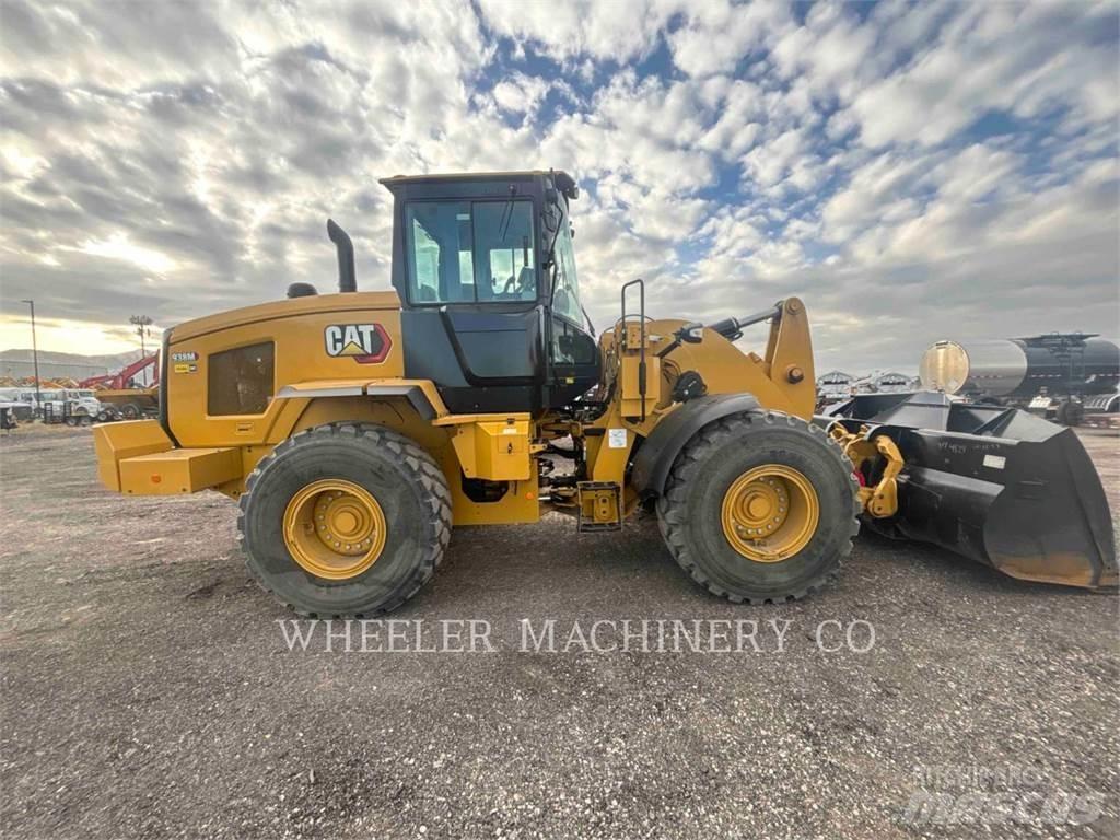 CAT 938M QC Wielladers
