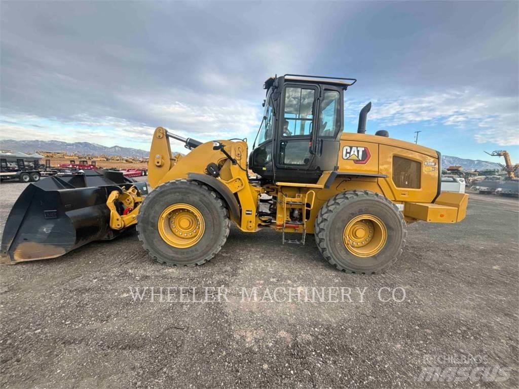 CAT 938M QC Wielladers