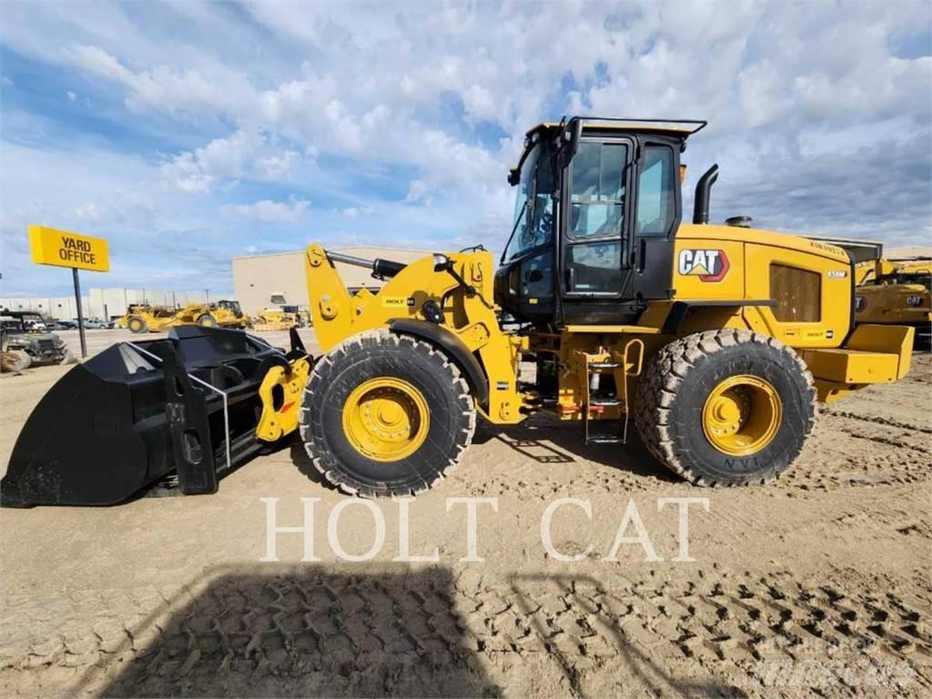CAT 938M QC Wielladers