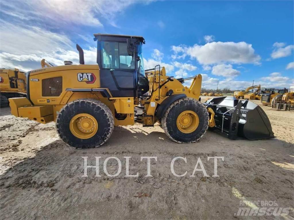 CAT 938M QC Wielladers