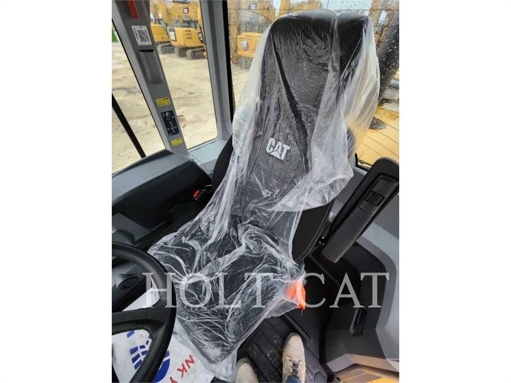 CAT 938M QC Wielladers