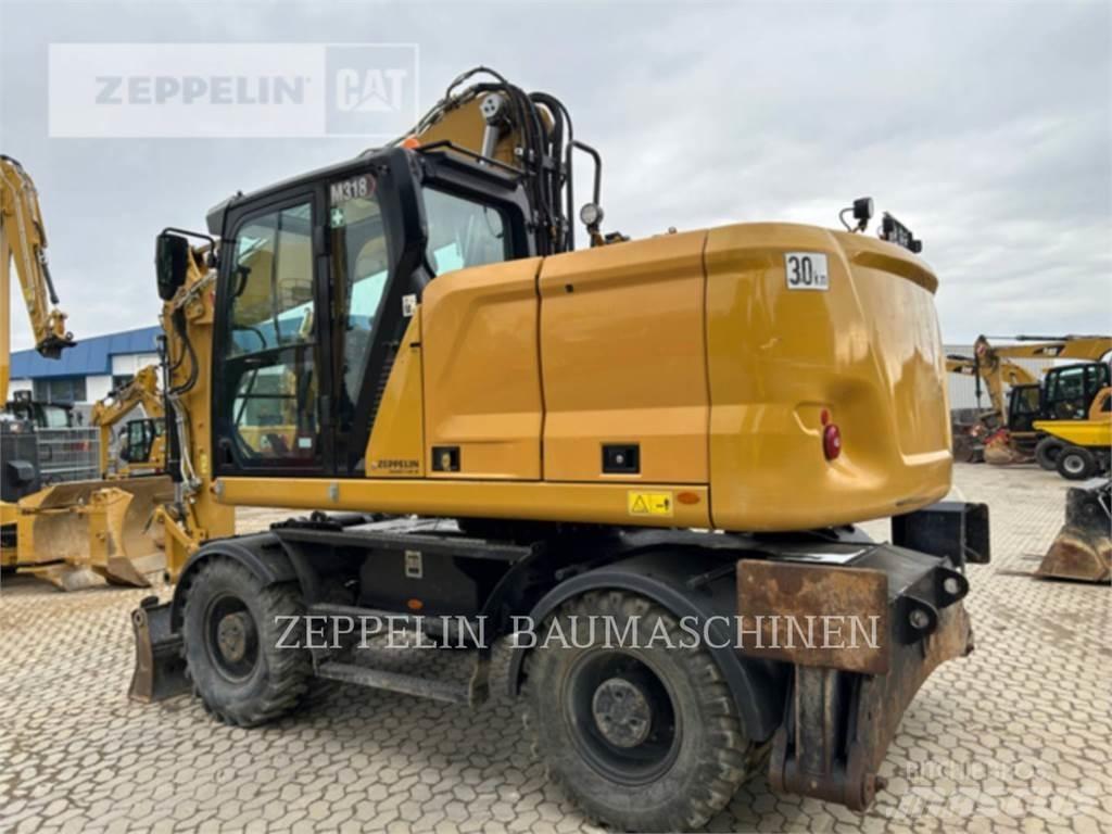 CAT M318-07A Wielgraafmachines