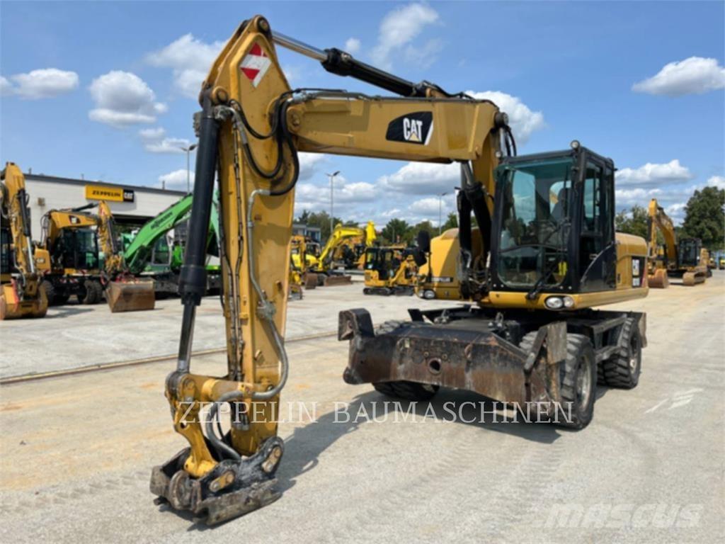 CAT M318D Wielgraafmachines