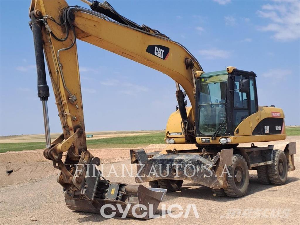CAT M318D Wielgraafmachines