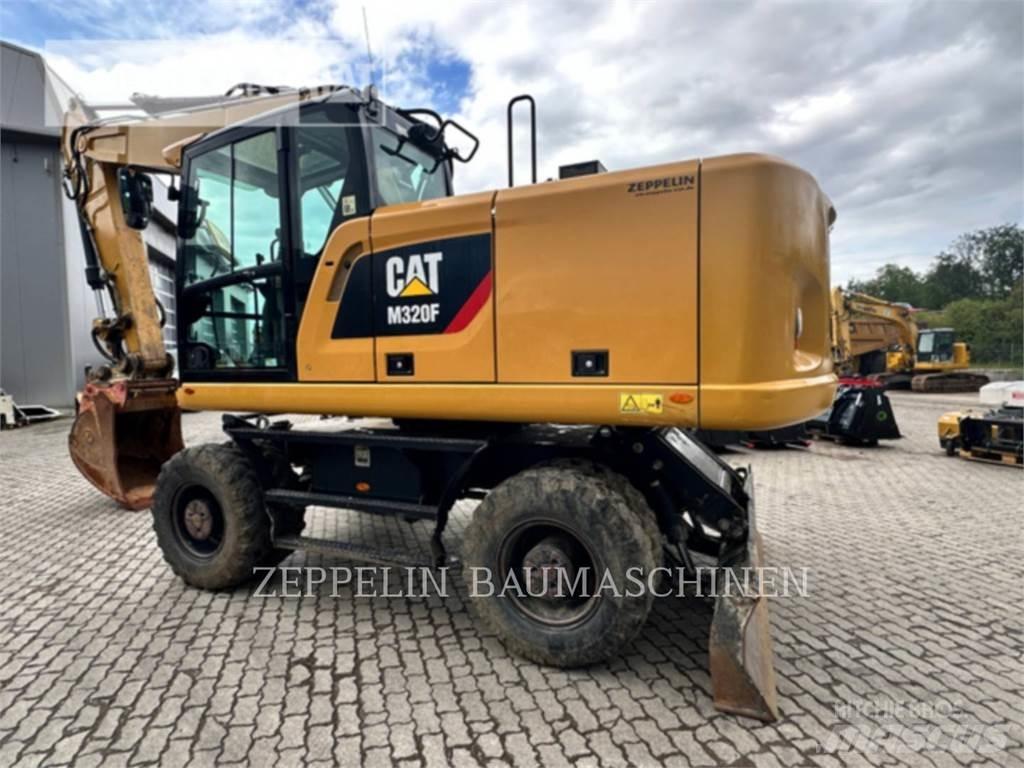 CAT M320F Wielgraafmachines