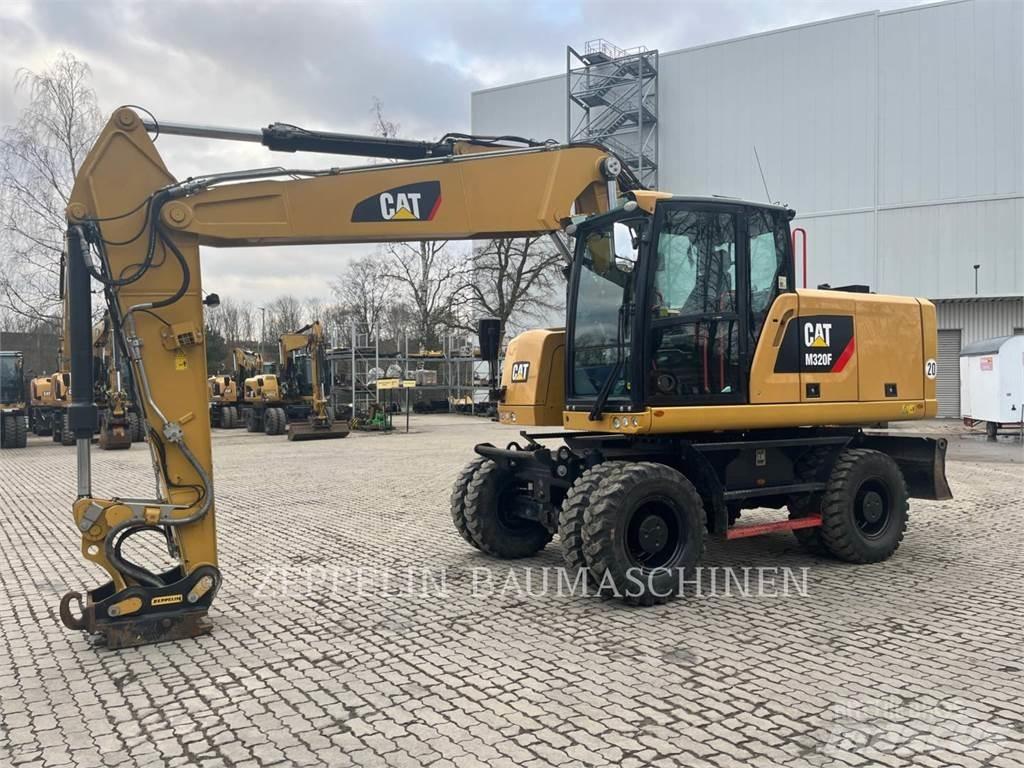 CAT M320F Wielgraafmachines