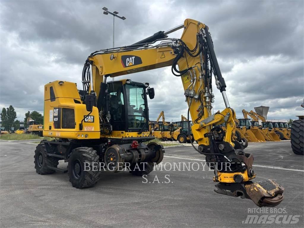 CAT M323F Wielgraafmachines
